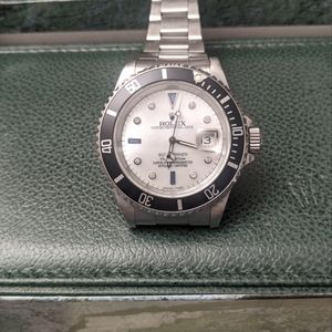 1997 Rolex Submariner in polished stainless steel.